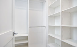 Large walk-in closet of bedroom 2, identical to the walk-in closet of bedroom 3